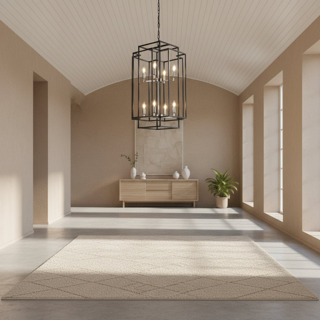 Black chandelier hanging in a room with white walls and French doors.