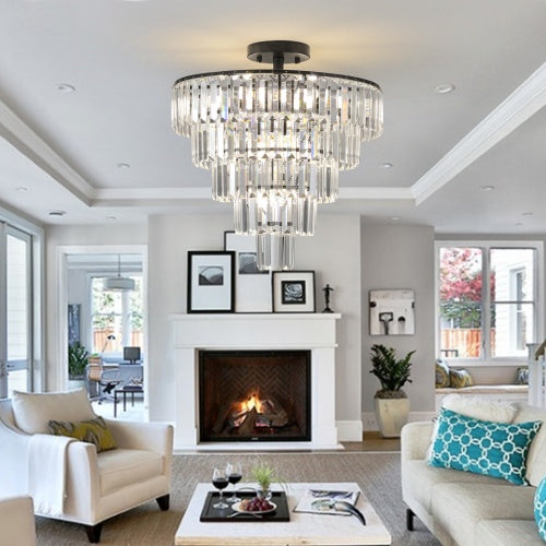 Living room with a chandelier, fireplace, and decorative elements.