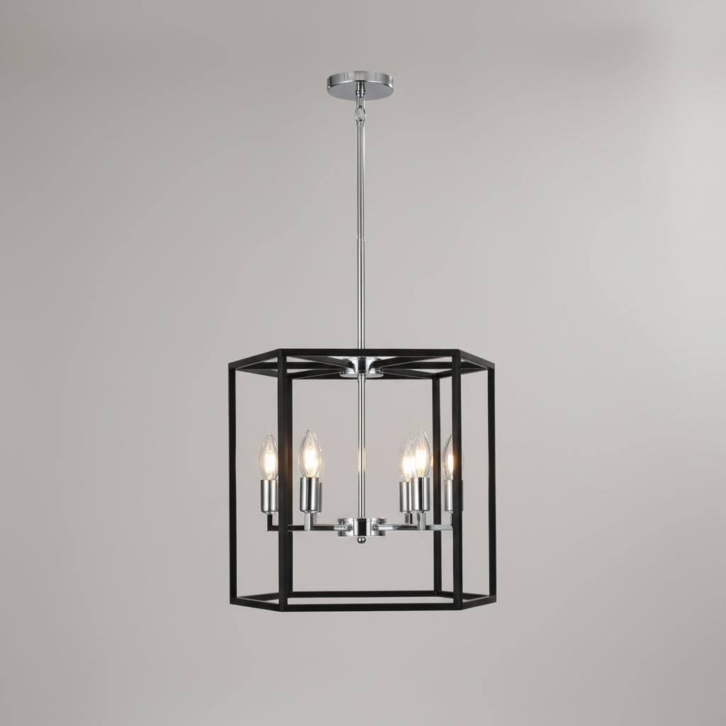 Close-up of a modern chandelier with metallic arms and glass shades.