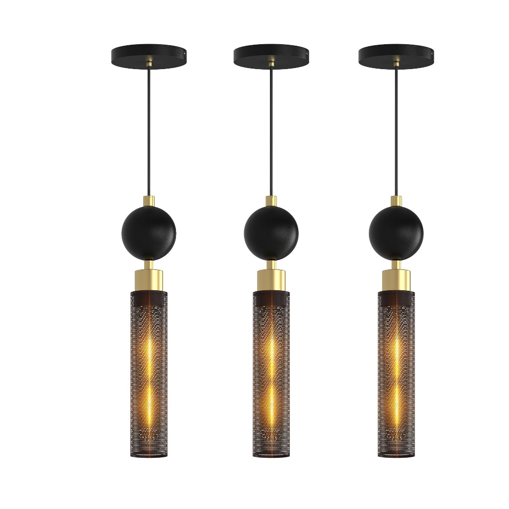 Three modern pendant lights with black spherical shades and gold cylindrical bases on a white background.